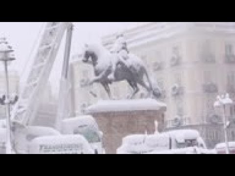 Madrid residents react to freak snowfall